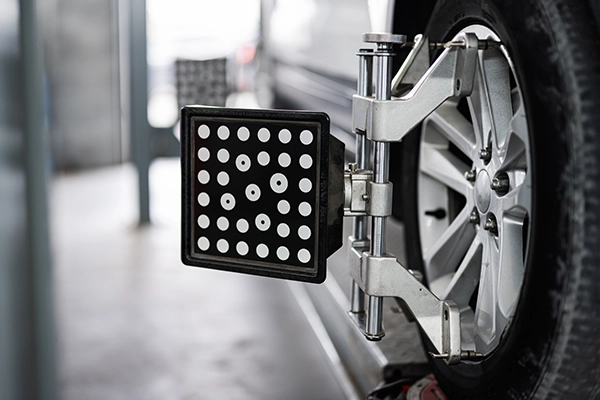 Car on wheel alignment rack