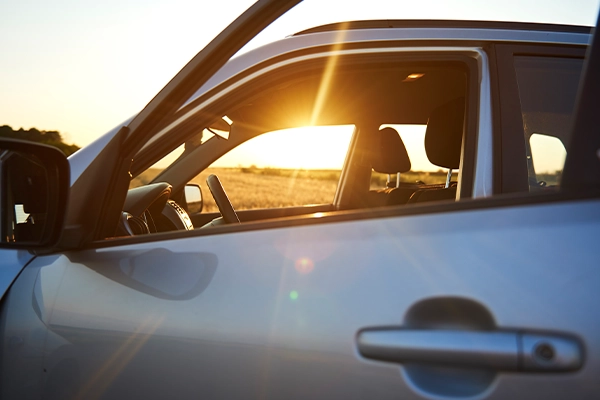 Silver SUV with windows down