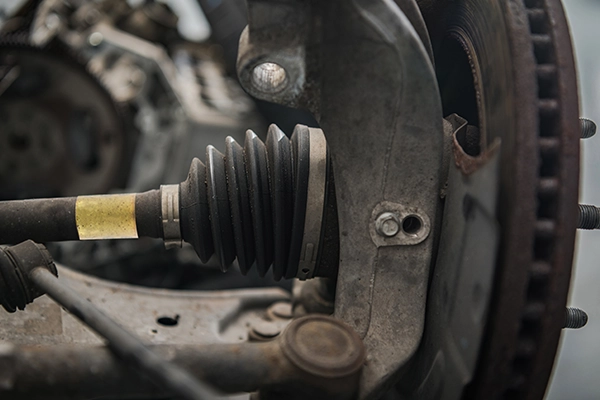 CV axle boot connected to wheel