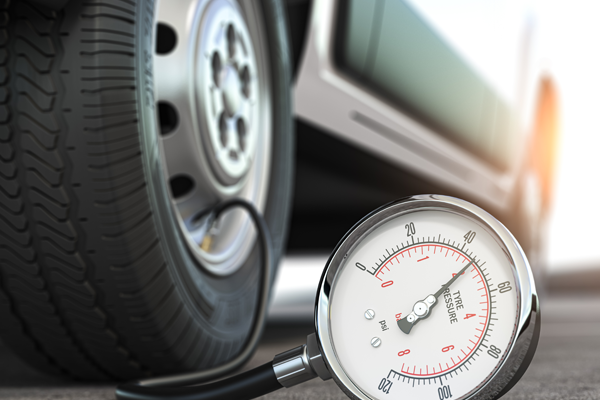 Close-up look at a tire pressure gauge.